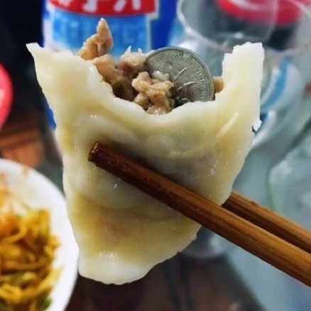北方人为什么习惯在饺子里面包硬币