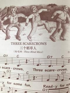 three scarecrows
