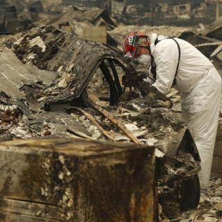 California wildfires: statewide death toll rises to 50 as search for remains continues