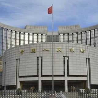 Gobernador de banco central afirma que China respetará calendario de apertura de mercado 