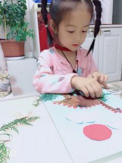 《小孩种花朵》